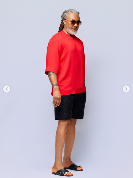 TNH model wearing a vivid red contemporary top